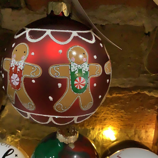 Glass ball ornament with gingerbread, 3 inches