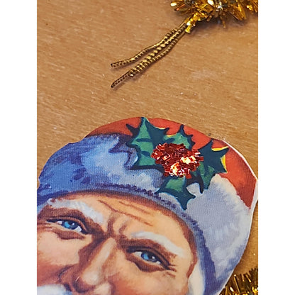 Replica of Antique Ornaments with Actual Vintage Paper Scraps and newer Crepe and Cotton Batting. Chr111