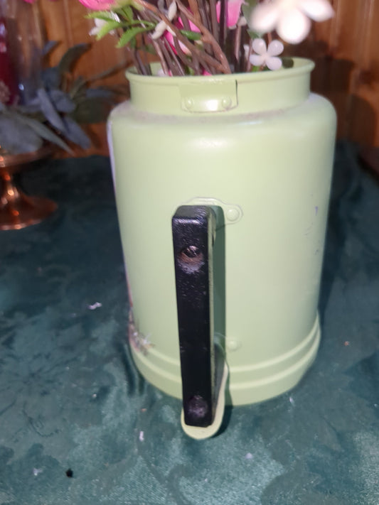 Vintage green aluminum coffee pot with a bunny