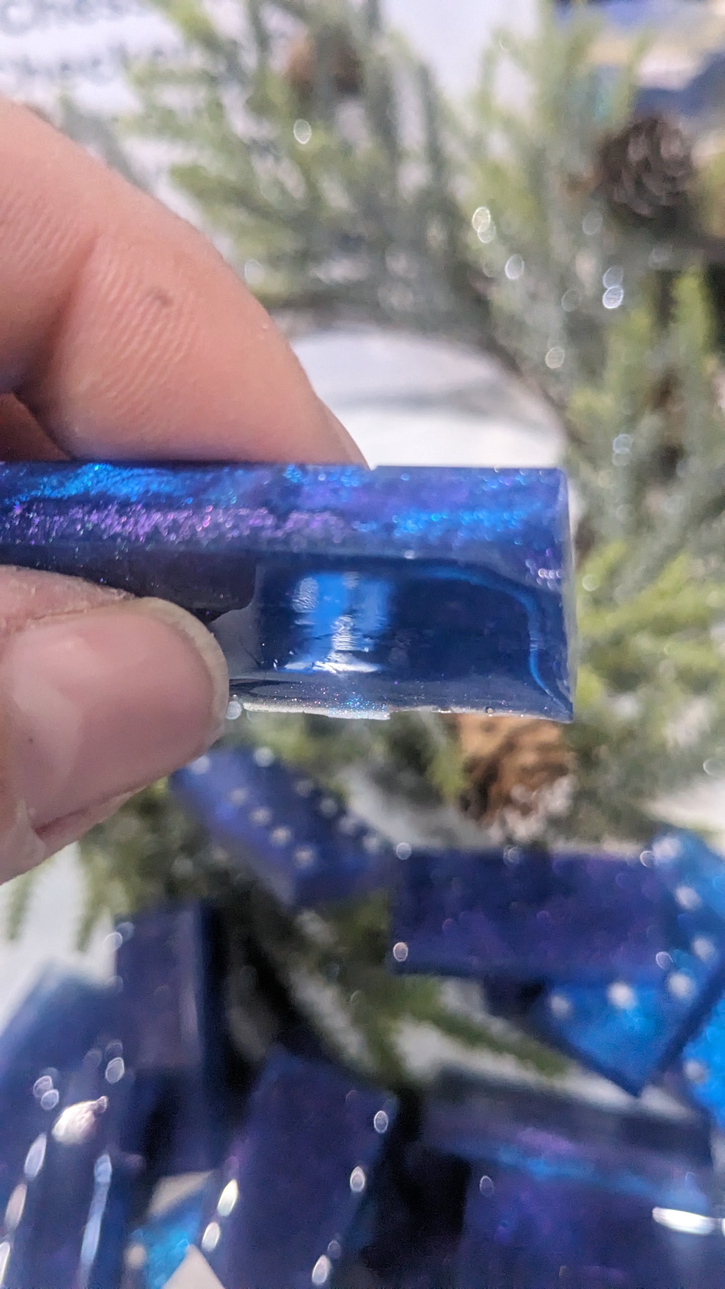 This is a set of handcrafted resin dominoes color changing blue and purple