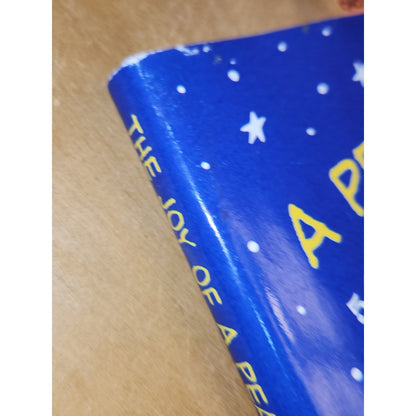 The Joy of A Peanuts Christmas 50 Years of Holiday Comics Schulz Hallmark bk01