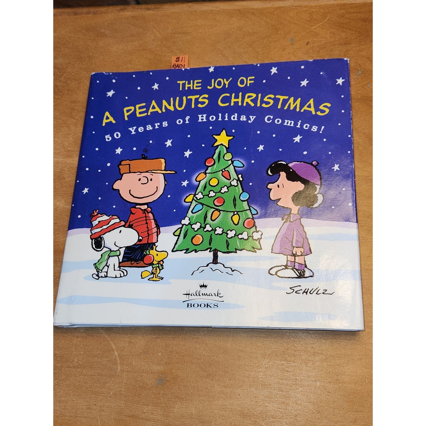 The Joy of A Peanuts Christmas 50 Years of Holiday Comics Schulz Hallmark bk01