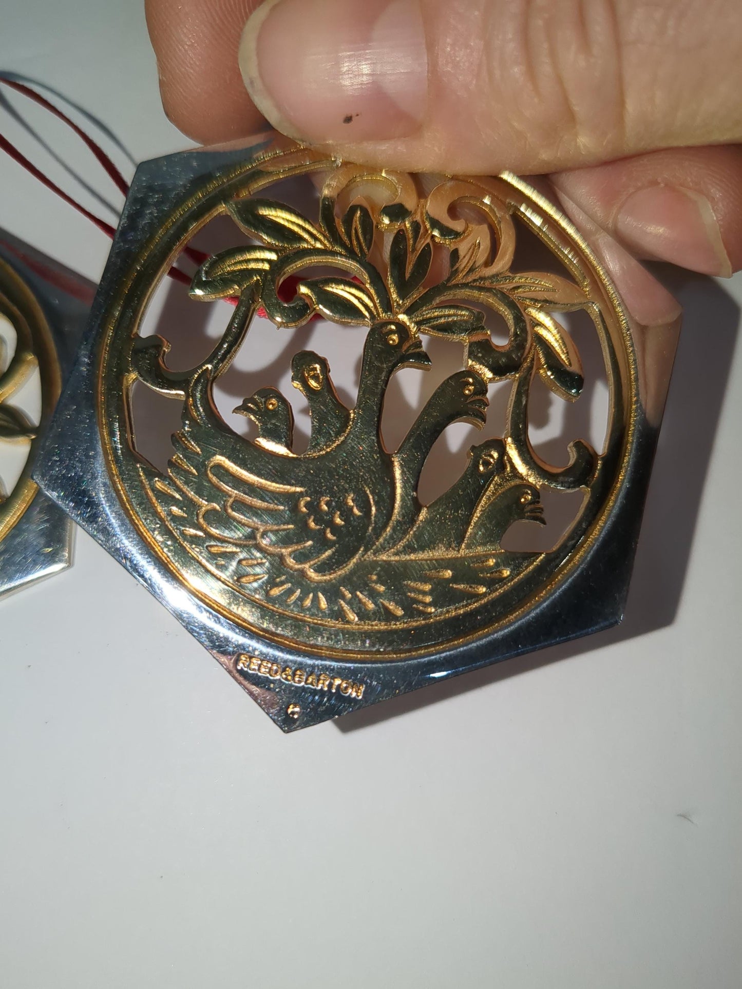 Reed & Barton The 12 Days of Christmas ornament collection. Five golden rings and six geese a-laying