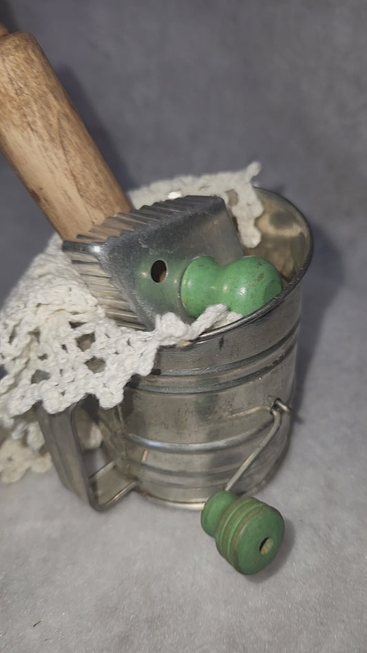 Flour sifter, rolling pin, doily, cookie cutter assemblage asb21