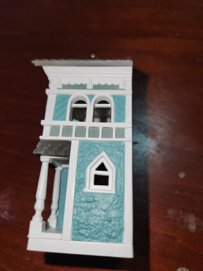 2010 a colonial Christmas Ornament Hallmark Nostalgic Houses, Shops, and Village. 27th in series. has original box