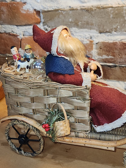 Vintage Bethany Lowe Santa Claus Wearing Wool in a Woven Sleigh With Toys AS IS s90