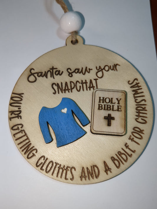 Ornament or car charm.  Santa saw your Snapchat