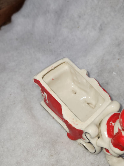 Vintage Kreiss Santa Pulling His Sleigh While his Reindeer are Snoozing inside Sleigh planter candy dish