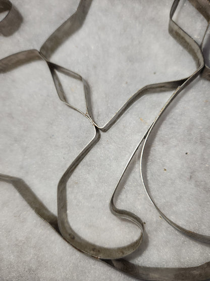 CC21 vintage 32 in 1 scrapless stainless steel cookie cutter