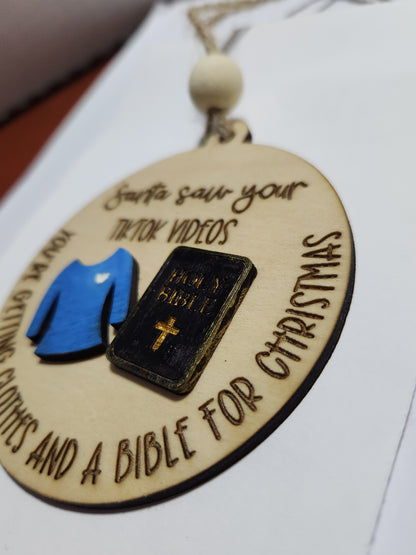 Ornament or car charm.  Santa saw your tiktok videos