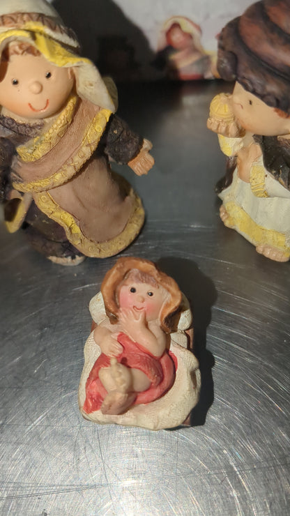vintage Dixon's children Nativity. Made of resin, 2 and 1/4 in high, and seven pieces cn1