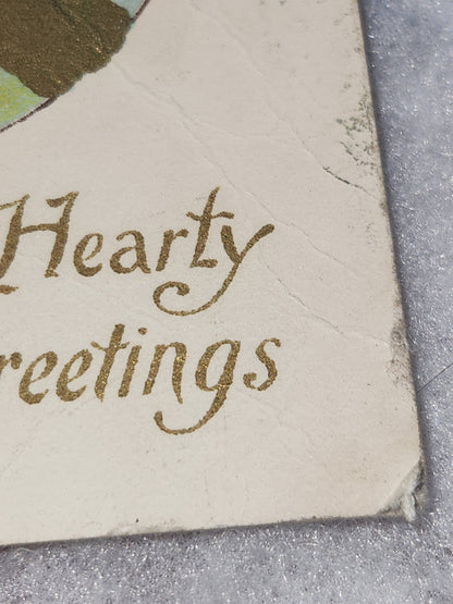 Antique Christmas Postcard Heaty Greetings with Sailboats and Life Preserver 1910 not mailed pc66