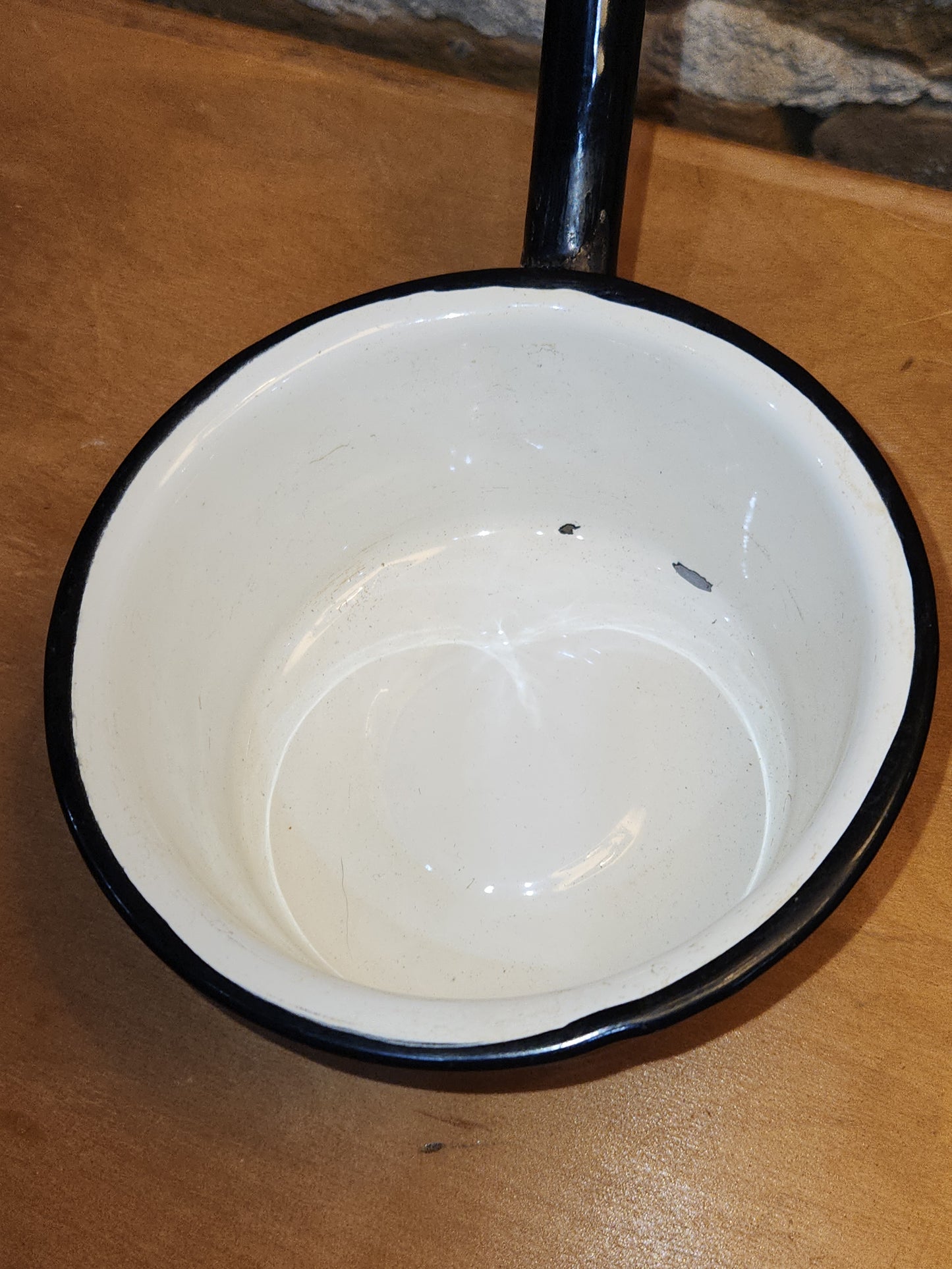 Vintage White Enamel Ladle Water Diooer with black handle and trim. En87