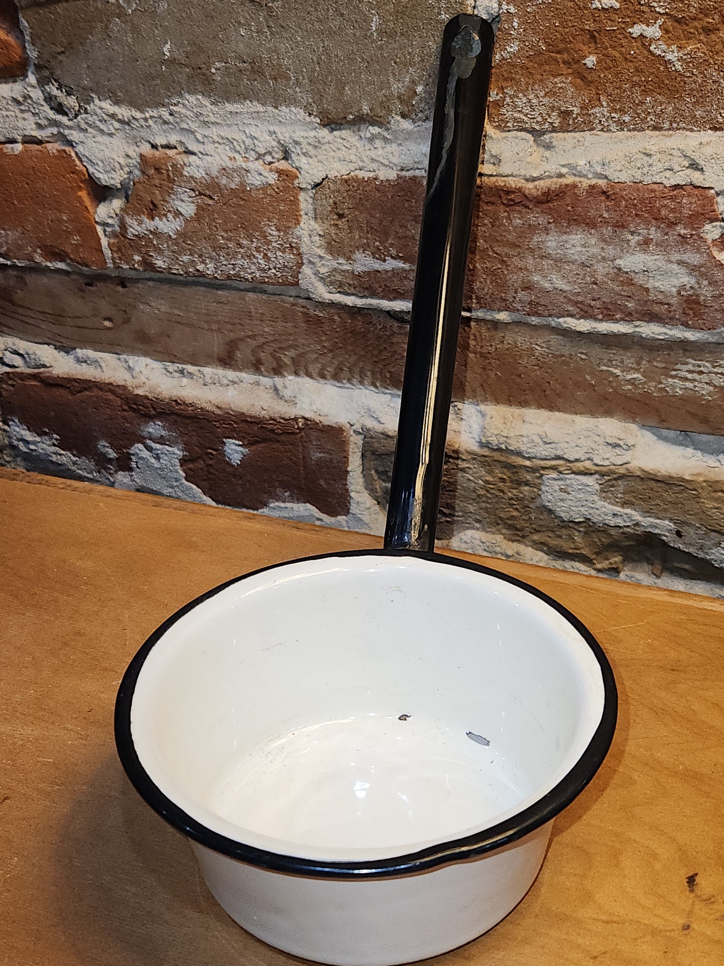 Vintage White Enamel Ladle Water Diooer with black handle and trim. En87