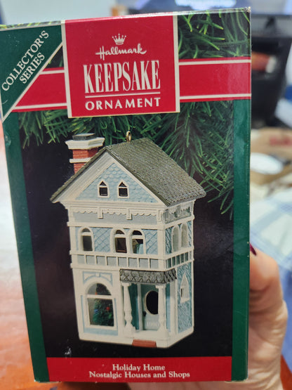 2010 a colonial Christmas Ornament Hallmark Nostalgic Houses, Shops, and Village. 27th in series. has original box