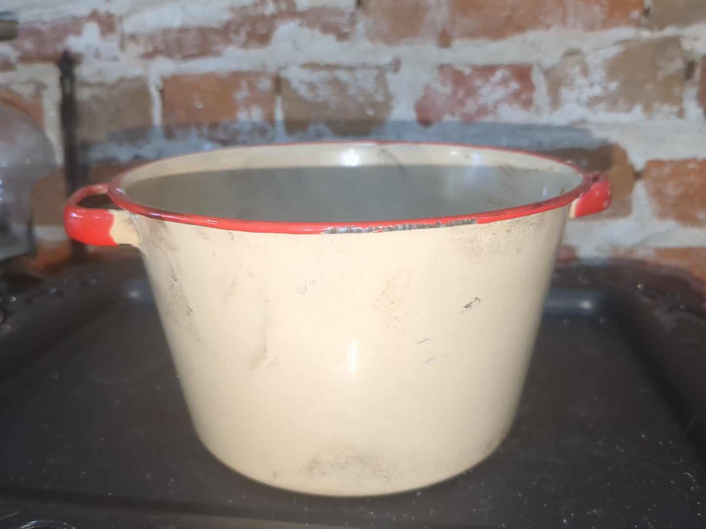 vintage cream and red enamel pot ena23