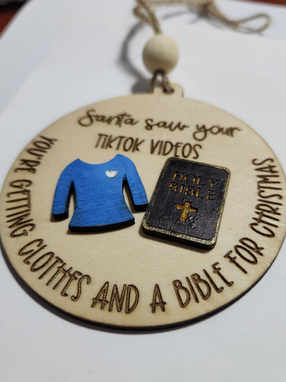 Ornament or car charm.  Santa saw your tiktok videos