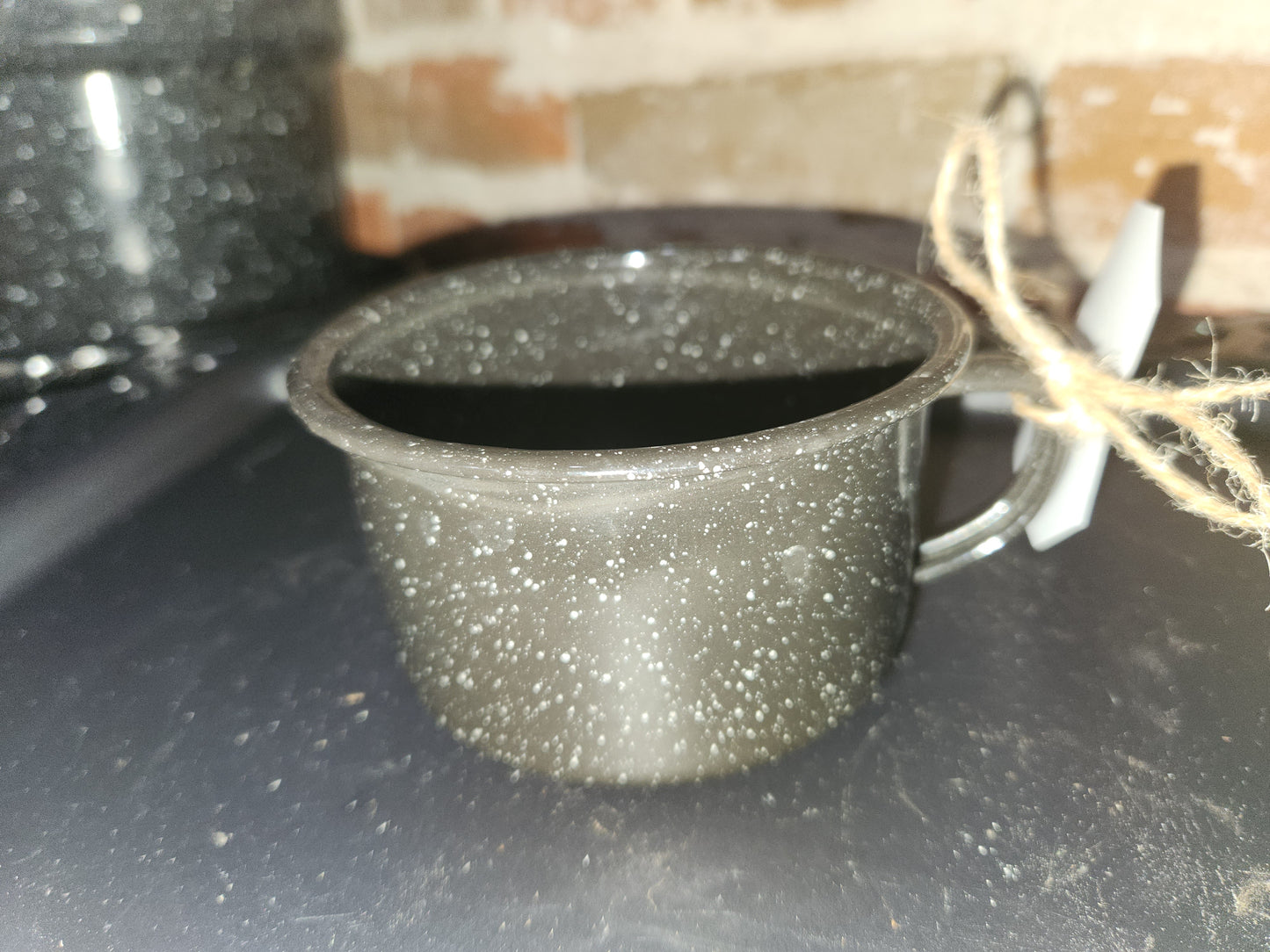 Vintage or vintage looking Black Enameled Cup with White speckles enm3