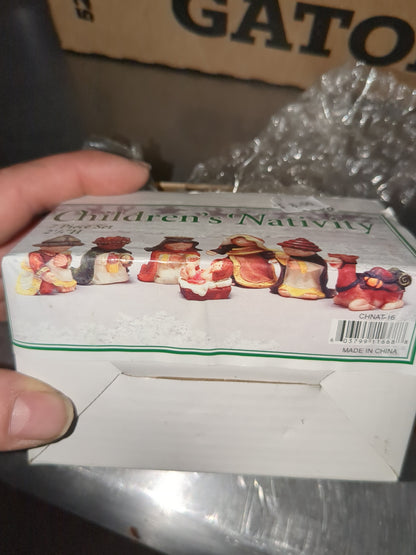 vintage Dixon's children Nativity. Made of resin, 2 and 1/4 in high, and seven pieces cn1