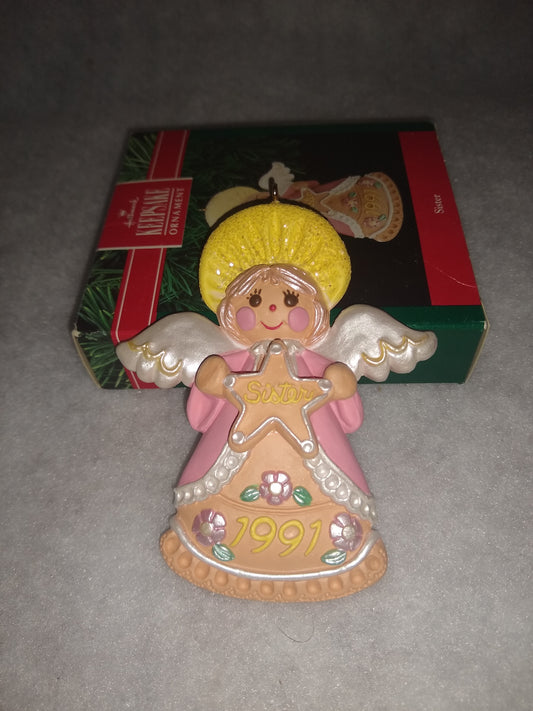 Vintage 1991 Hallmark Keepsake ornament Angel Holding gingerbread star Sister written on it ho92
