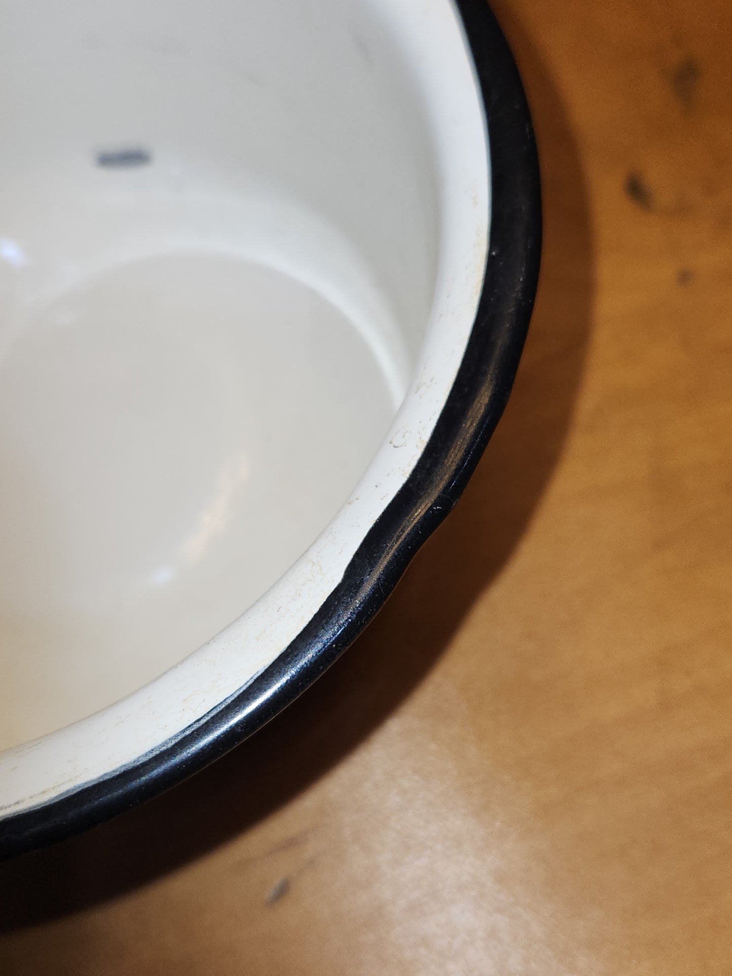 Vintage White Enamel Ladle Water Diooer with black handle and trim. En87