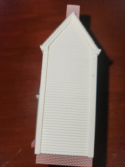 HH2010 a colonial Christmas Ornament Hallmark Nostalgic Houses.