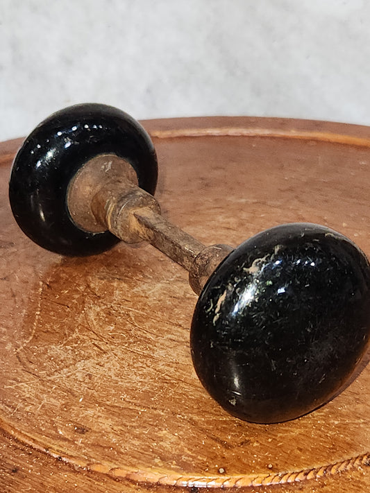 Vintage Antique Porcelain Black Door Knobs attached to a stem kn16
