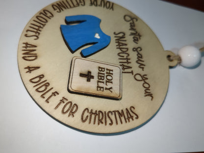 Ornament or car charm.  Santa saw your Snapchat