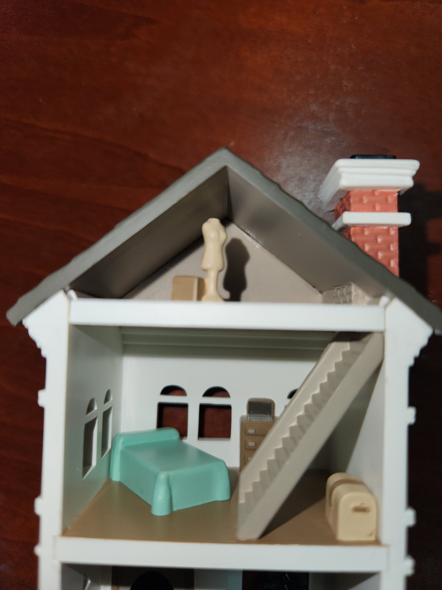 2010 a colonial Christmas Ornament Hallmark Nostalgic Houses, Shops, and Village. 27th in series. has original box