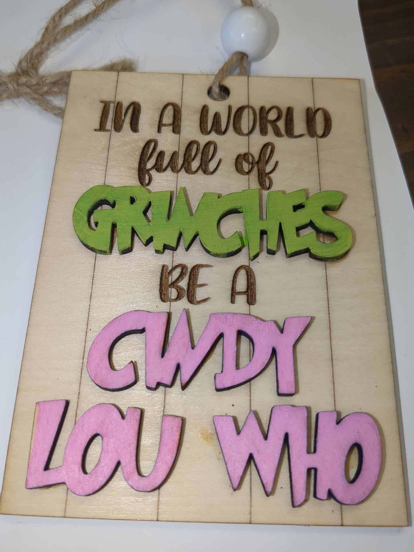 Ornament or car charm In a world of Grinches be a Cindy Lou Who