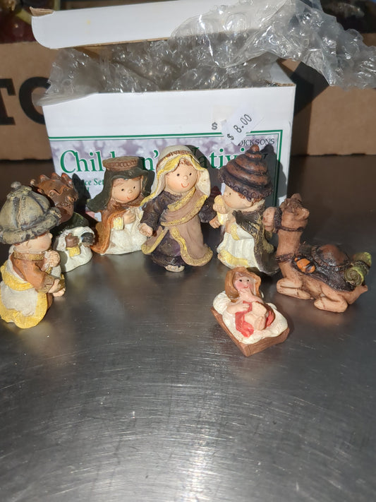 vintage Dixon's children Nativity. Made of resin, 2 and 1/4 in high, and seven pieces cn1