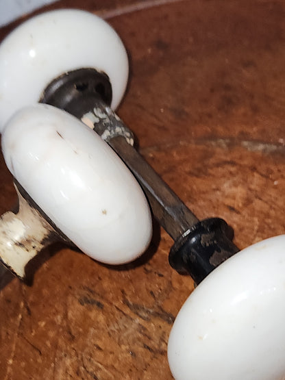 Vintage Antique ONE set of White Porcelain door knobs kn15. Recieve ONE set of 2 knobs attached to a stem