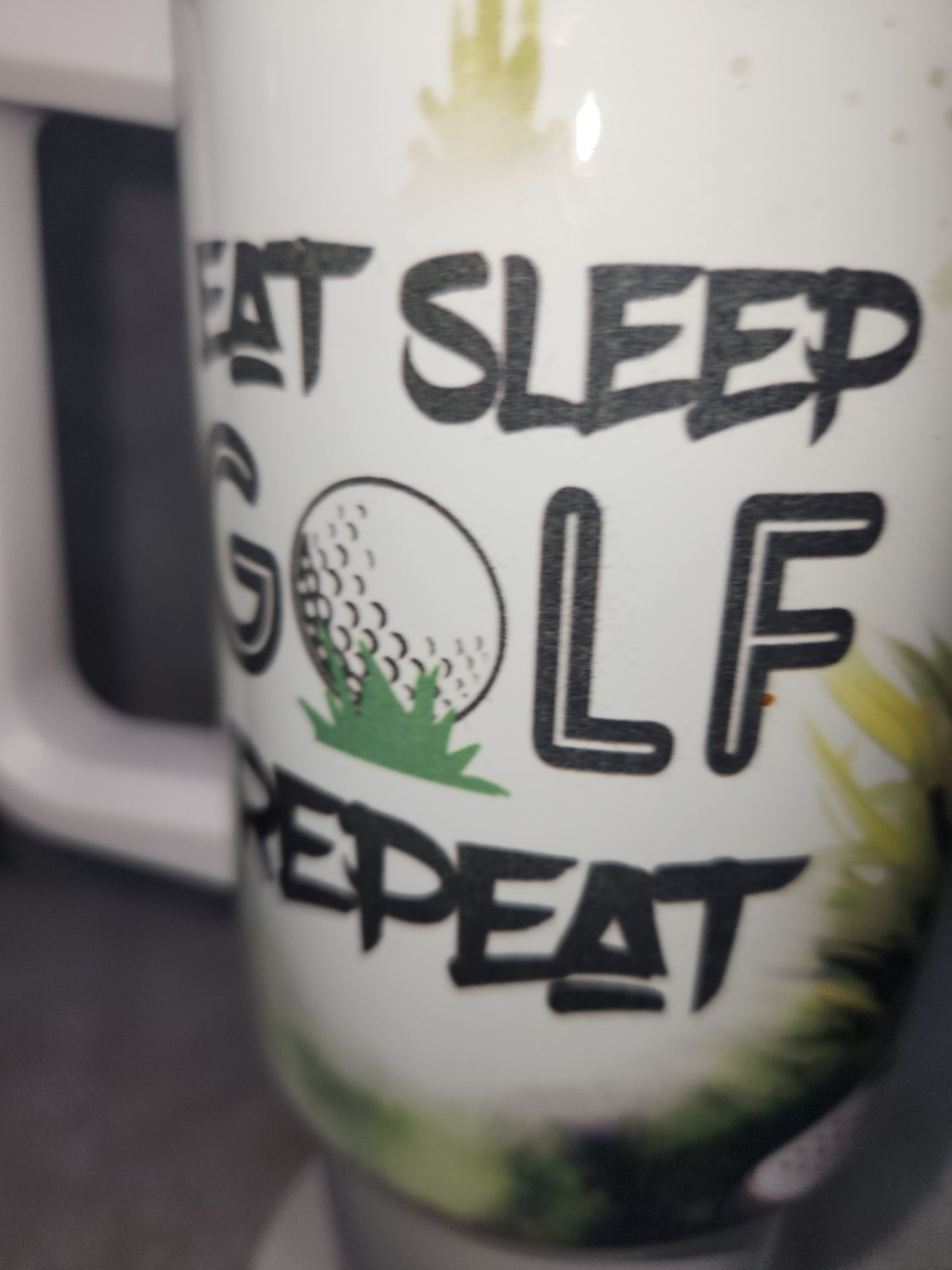 40 Oz Insulated Stainless Steel Tumbler says, "Eat Sleep Golf Repeat" tgo4