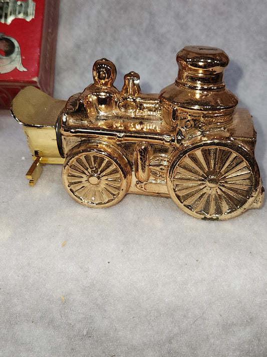 Avon Decanter First Volunteer gold fire truck Oland Cologne av561