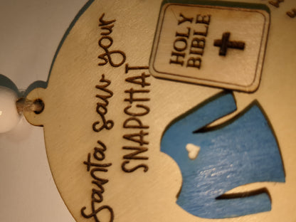 Ornament or car charm.  Santa saw your Snapchat