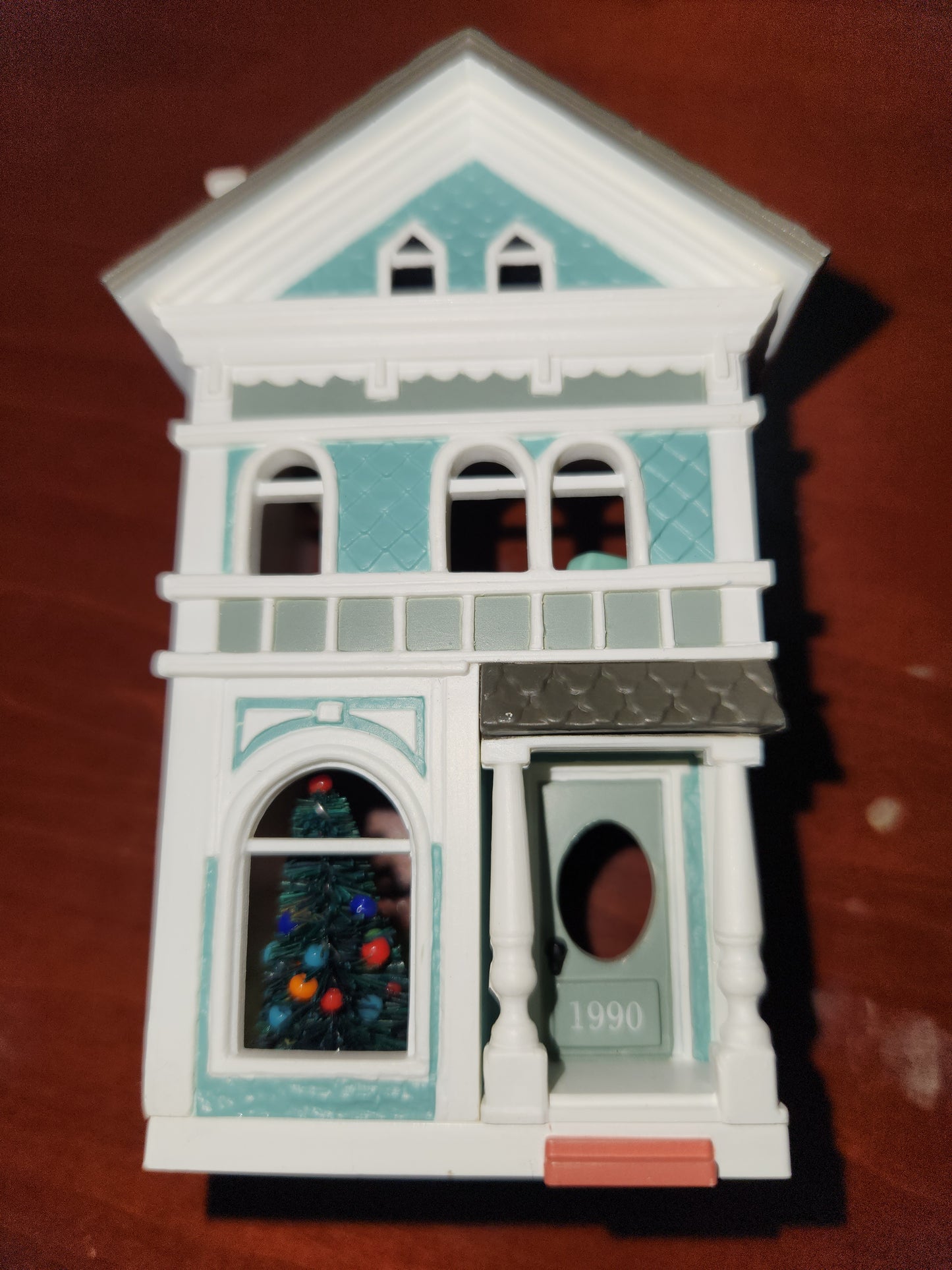 2010 a colonial Christmas Ornament Hallmark Nostalgic Houses, Shops, and Village. 27th in series. has original box
