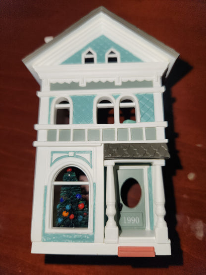 2010 a colonial Christmas Ornament Hallmark Nostalgic Houses, Shops, and Village. 27th in series. has original box