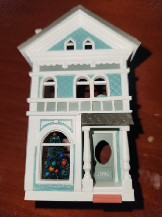 2010 a colonial Christmas Ornament Hallmark Nostalgic Houses, Shops, and Village. 27th in series. has original box