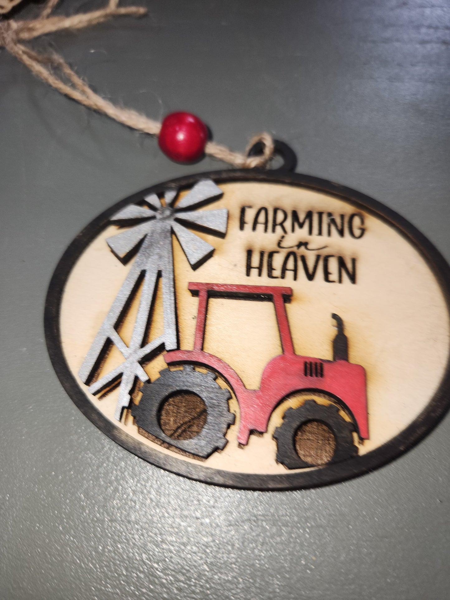 Ornament or car charm memorial memorial with red tractor and windmill
